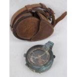 A British Military Officers field compass in ornate leather carry case, dated 1913.