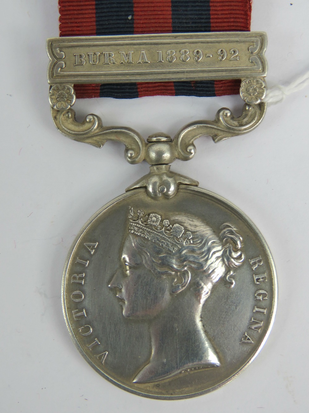 A Queen Victoria medal with 1889-92 Burma clasp, to 1065 Pte.