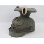 A WWI German Uhlans cavalry helmet dated 1915 with issue stamps,