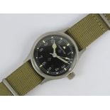 A military style Hamilton watch with 36mm steel case with screw back,