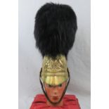 A superb 19th century First Kings Dragoon Waterloo brass helmet,