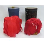 Two Naval Officers fur plumes, one in original double lidded tin.