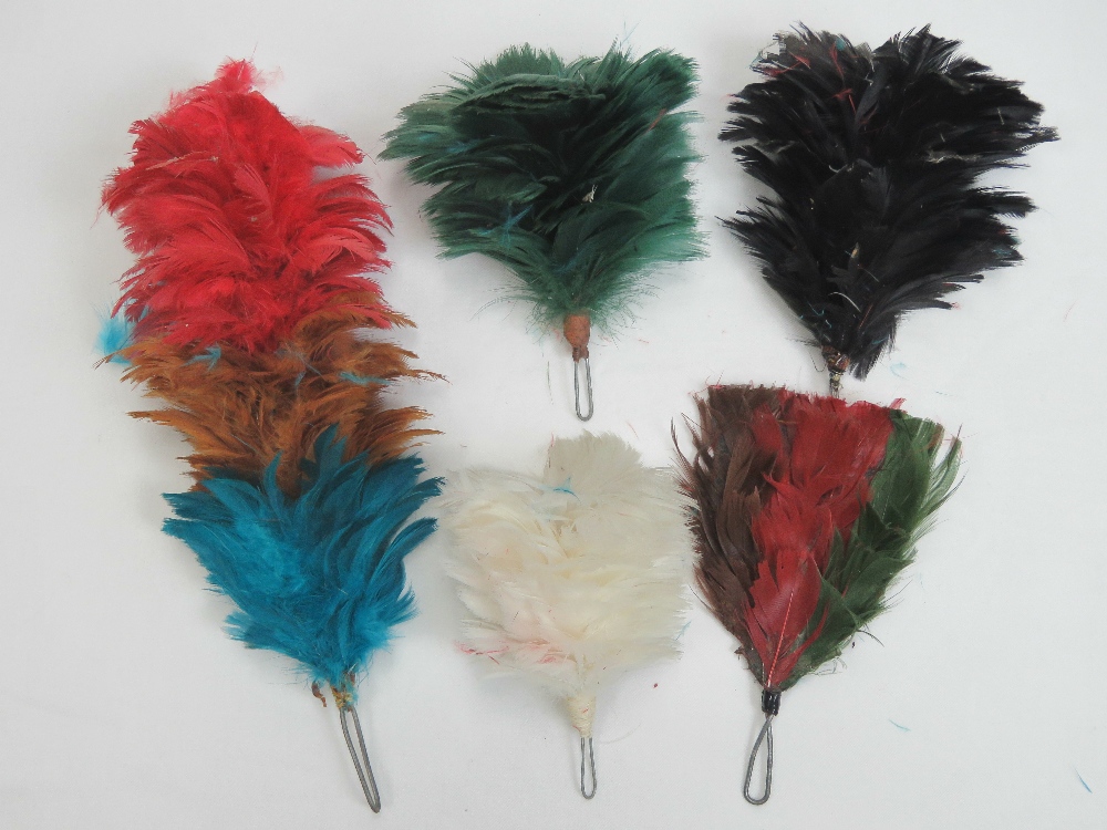 Five assorted dyed feather military hat