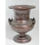 An Oriental bronzed brass footed vase de