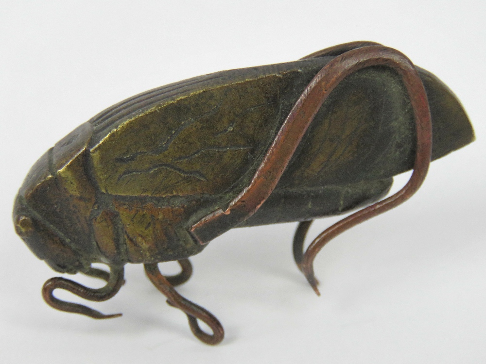 A bronze locust complete with six legs w - Image 2 of 2