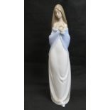 A Nao figurine, slender girl in wrap, 36