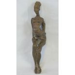 A 20th century cast bronze figurine; sea