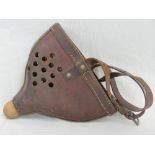 An unusual vintage leather muzzle having