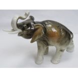 A Royal Dux African Elephant, one tusk s