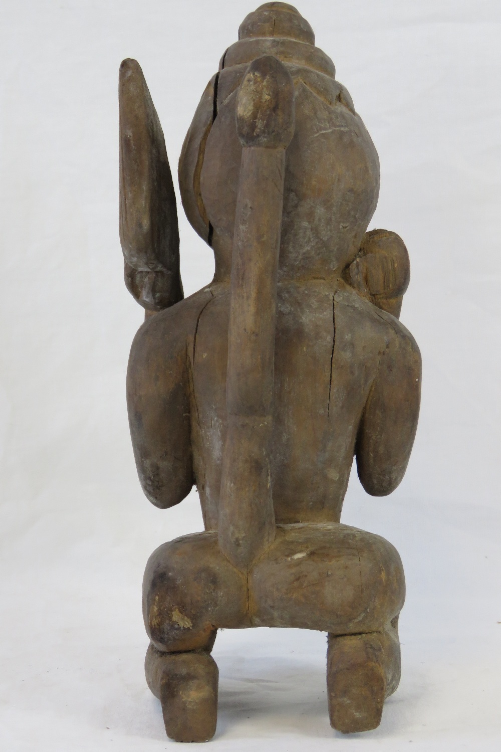 An antique carved wooden fertility figur - Image 4 of 4