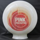 An original Pink Paraffin milk glass pump globe standing 42" high, complete with original transfers.