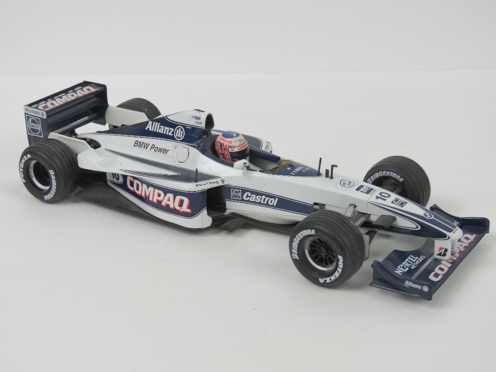 A 1:18 scale Hot Wheels Williams China 2000 (Jensen Button) F1 car, 26.5cm.