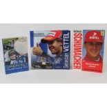 Books; three paperbacks ' Damon Hills Championship Year', 'Michael Schumacher Controversial Genius',