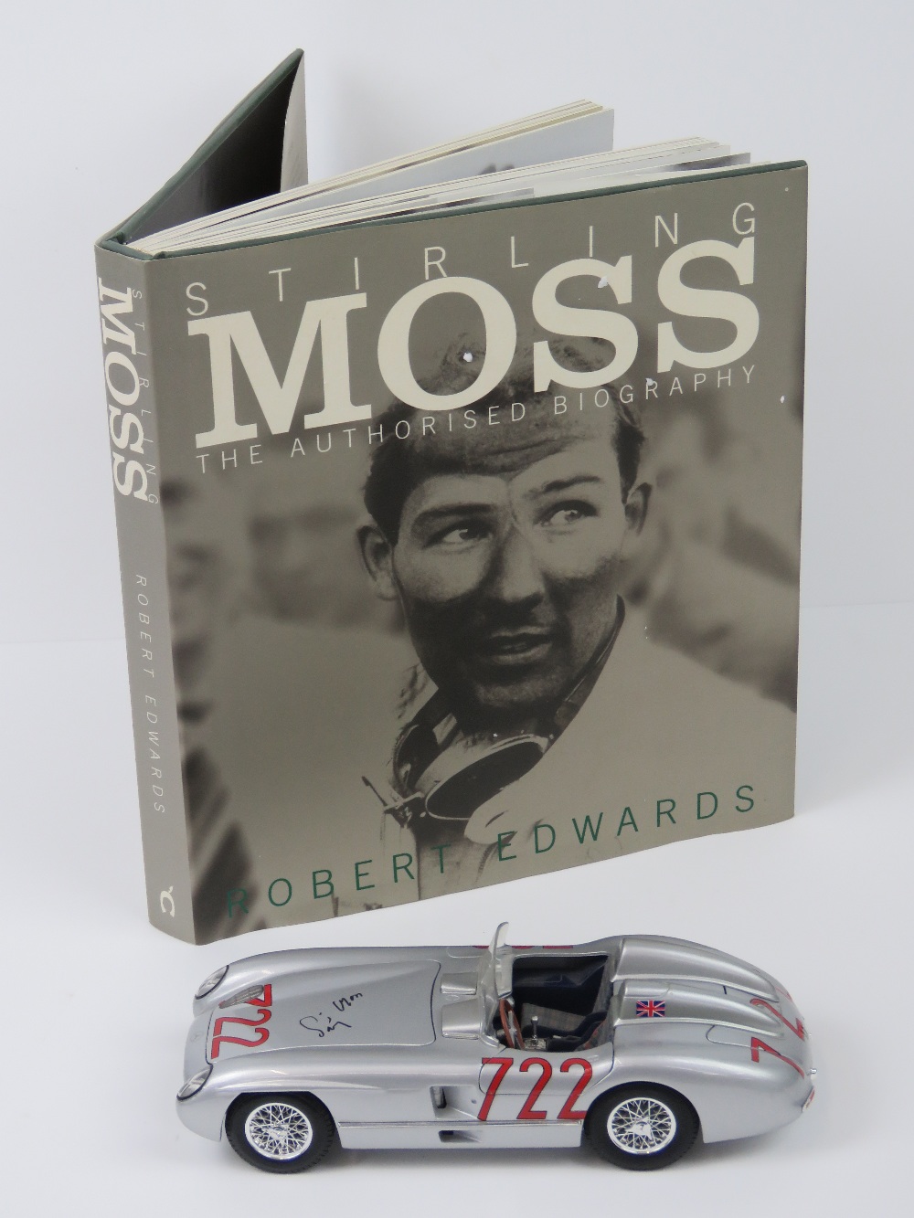 A 1:18 scale Stirling Moss Mercedes 300SL R722 by Maisto, signed to the bonnet by Sir Stirling Moss,