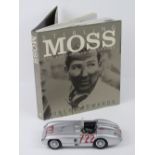 A 1:18 scale Stirling Moss Mercedes 300SL R722 by Maisto, signed to the bonnet by Sir Stirling Moss,