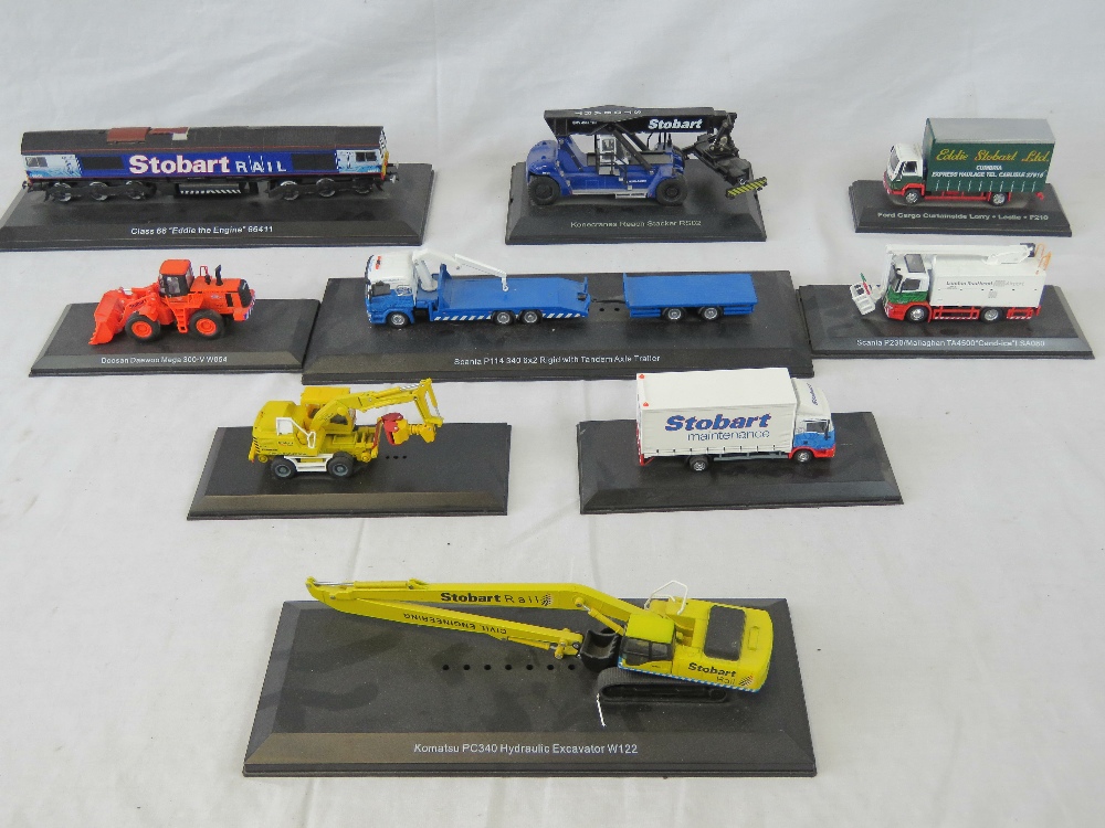 Nine mounted Eddie Stobart themed vehicles including a class 66 locomotive, Scania wagon and drag,