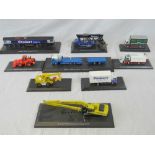 Nine mounted Eddie Stobart themed vehicles including a class 66 locomotive, Scania wagon and drag,