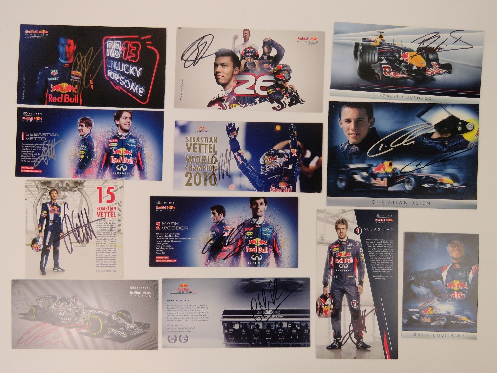 An unrepeatable collection of twelve signed Red Bull racing autograph cards including;