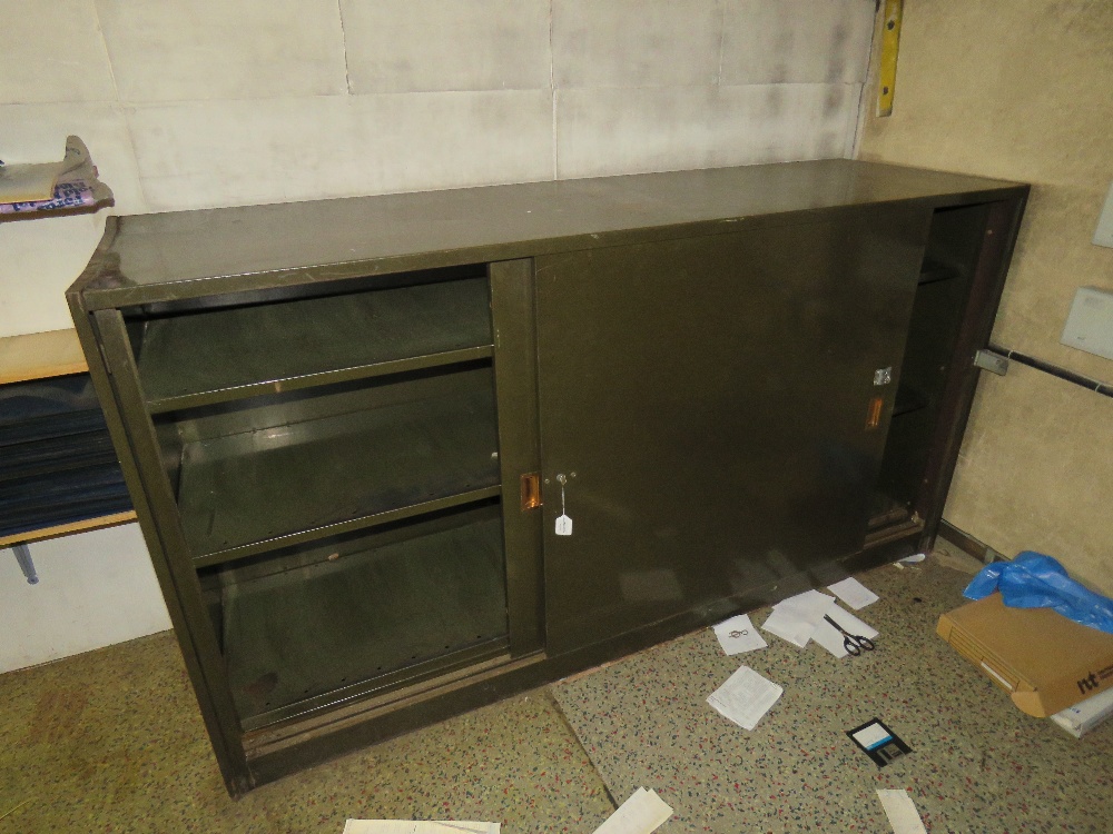 A large steel sliding door cabinet havin