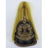 An early 20th century Edward VII Kings Own Norfolk Imperial Yeomanry leather helmet having gilt