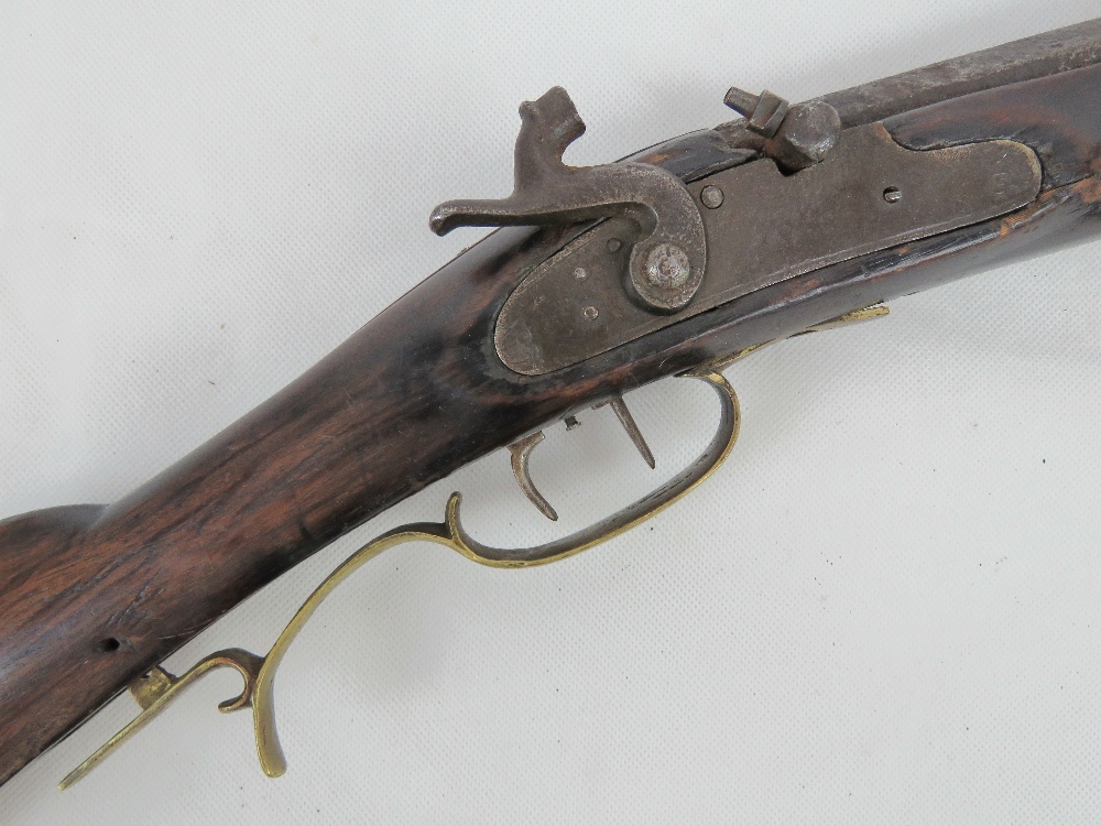 An antique .35 calibre percussion rifle with double set triggers and heavy octagonal barrel. - Image 2 of 3