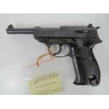 A deactivated WWII German Walther P38 9mm Pistol, Cyq 1940 production having German marks upon.
