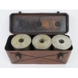 A quantity of WWII German 11cm JFH cannon cases in original carry case dated 1943,
