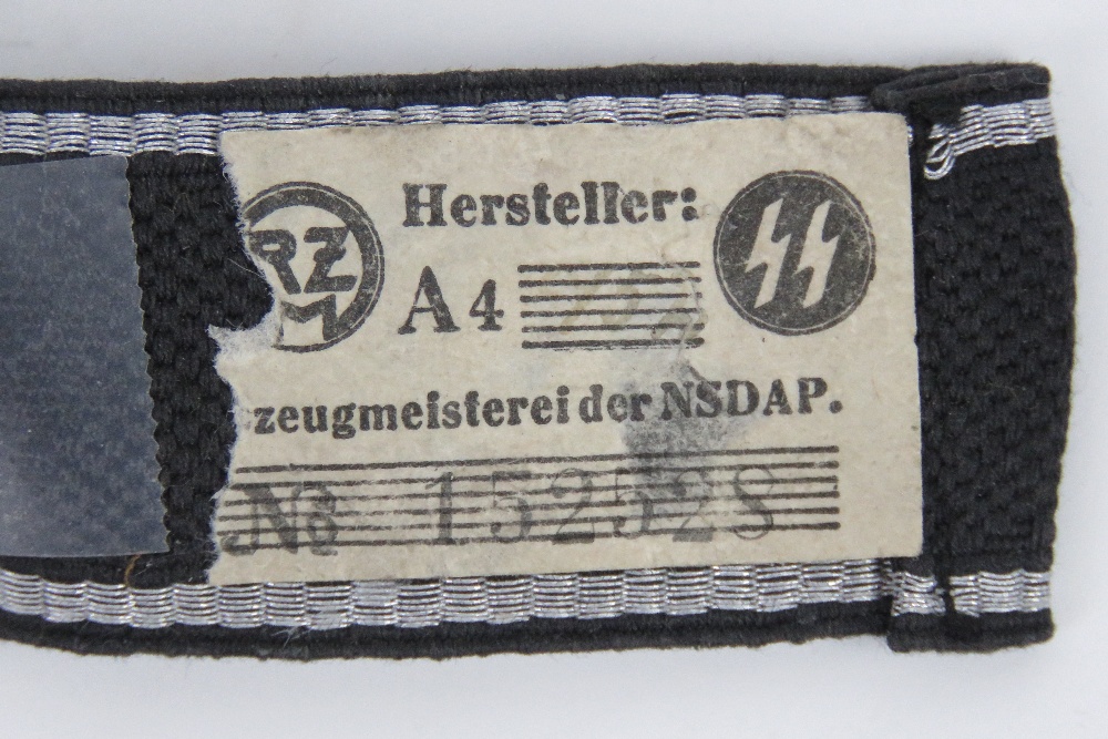 An SS Officers tunic cuff title 'SS Inspection' with SS Hersteller paper label verso, - Image 2 of 3