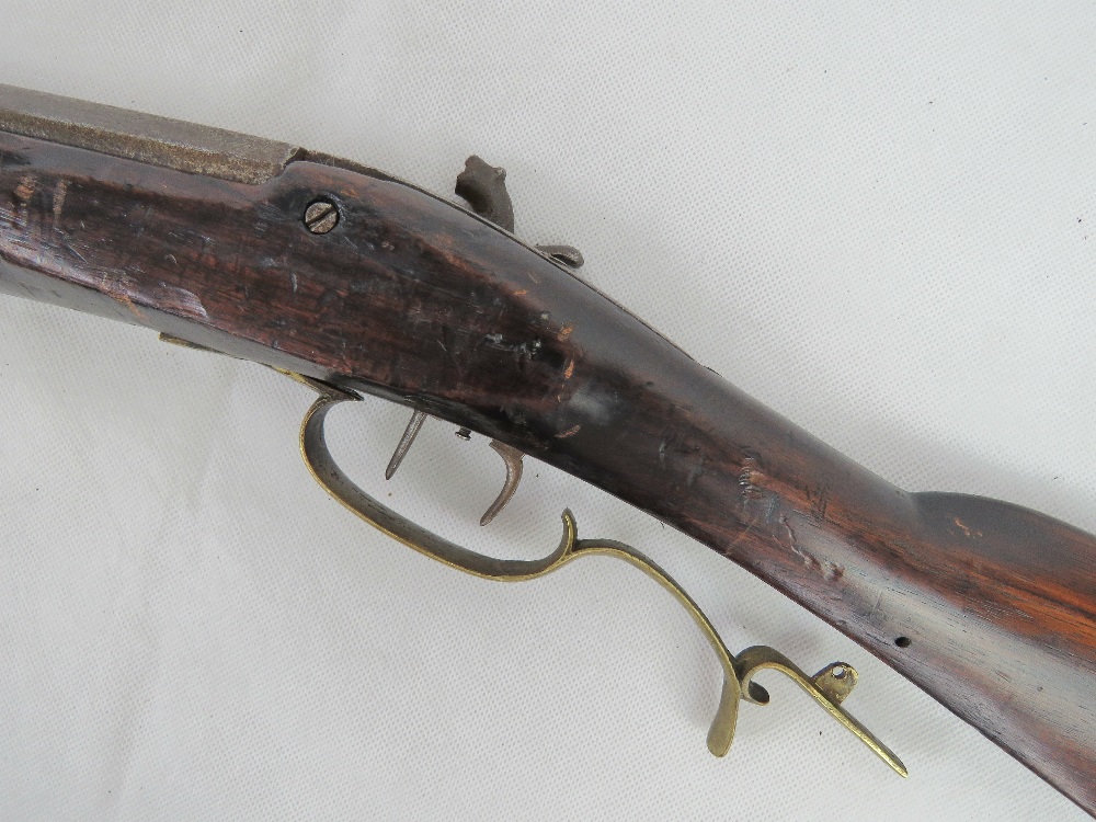 An antique .35 calibre percussion rifle with double set triggers and heavy octagonal barrel. - Image 3 of 3