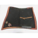 A Queen Victoria Crimea Period black Officers saddle cloth having gold braiding and old repairs