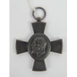 A German WWI Buyern Ludvik bronze cross bearing date 7th 1st 1916.