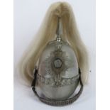 A 19th century silvered polished steel Hampshire Yeomanry helmet with white horsehair plume,