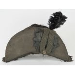 An early 19th century silk bicorn hat complete with sash and plume, a/f.