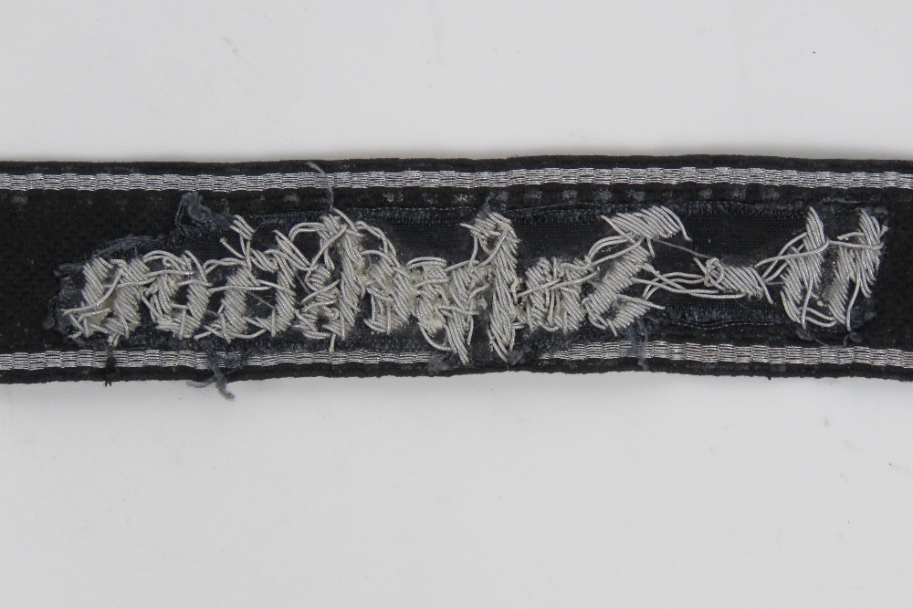 An SS Officers tunic cuff title 'SS Inspection' with SS Hersteller paper label verso, - Image 3 of 3