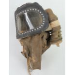 A WWII British civilian issue baby gasmask dated 1939 having original government plate upon,