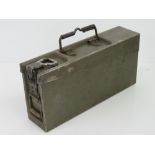 A WWII German belted ammunition can for the MG34 and MG42 machine guns,