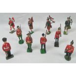 Four Britains toy soldiers Scottish regiments bagpipers two Scottish regiments Infantrymen and four