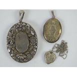 A sterling silver heart shaped locket on chain,