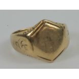 A 10ct gold signet ring having erased engraving to front,