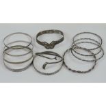 Five assorted sterling silver bangles, 1.