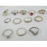 Twelve silver rings set with assorted stones including 925 silver and white cz solitaire,