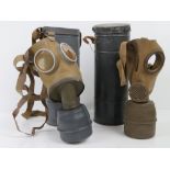 Two WWII Axis Military Issue gas masks,