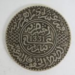 A Moroccan Islamic 10 Dirhams silver coi