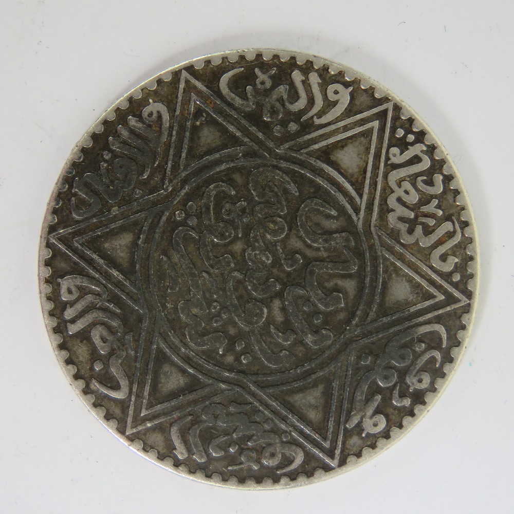 A Moroccan Islamic 10 Dirhams silver coi - Image 2 of 2