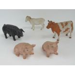 Five ceramic animals including cow, goat