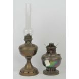 Two brass oil lamps, each with chimney.