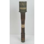 An inert WWII German 'potato masher' stick grenade with porcelain pull chord ball.