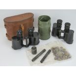 Two pairs of WWII British Officers binoculars together with a uniform studs and buttons repair kit.