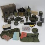 A quantity of assorted miltaria including; canister tin, NBC testing kit,