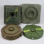 Four inert Cold War era Soviet/Yugoslavian anti-tank land mines.